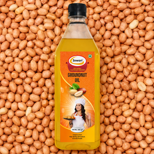 Sewari Cold Pressed Groundnut Oil. Shows peanuts in the background