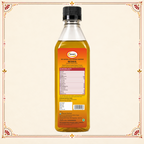 Sewari Cold Pressed Mustard Oil. Shows mustard seeds in the background
