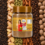 Sewari Tea Masala Gold. Shows 6 spices in the background, black pepper, ginger, cardamom, cinnamon, clove, nutmeg.